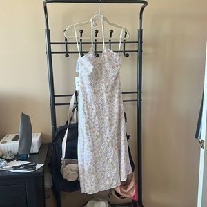 Floral small dress from Sunday best. Light and comfortable great for the beach.